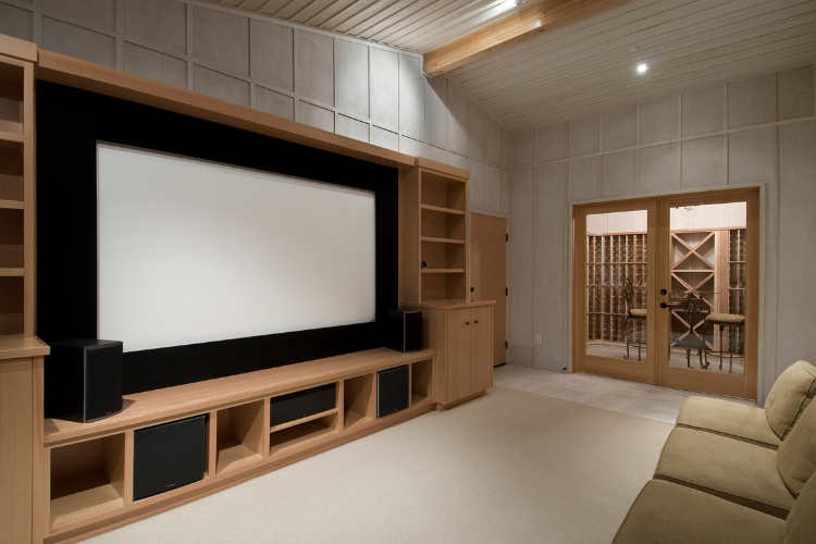 A simple brown and white smart home theater setup 
