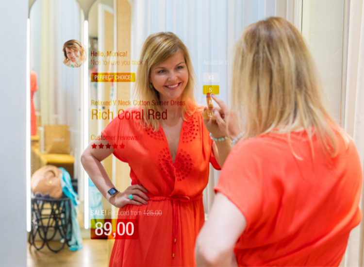 A woman shopping online through a smart mirror